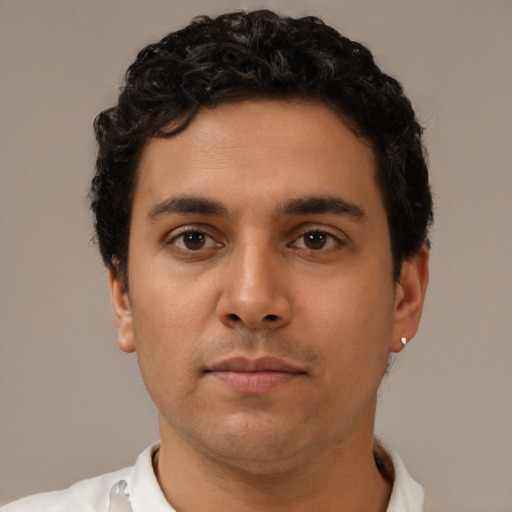 Neutral latino young-adult male with short  brown hair and brown eyes