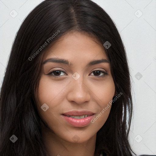 Joyful latino young-adult female with long  brown hair and brown eyes