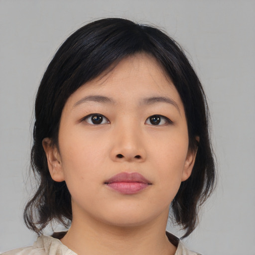 Neutral asian young-adult female with medium  black hair and brown eyes