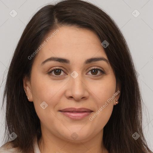 Joyful white adult female with medium  brown hair and brown eyes