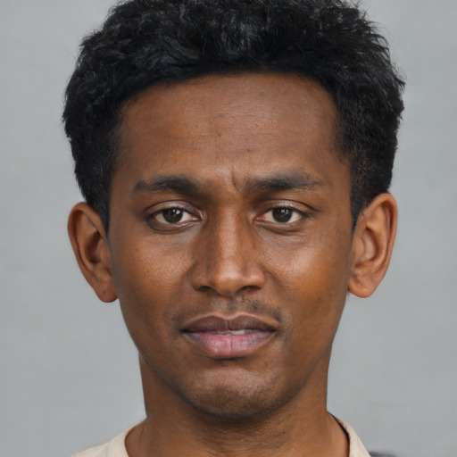 Neutral black young-adult male with short  black hair and brown eyes