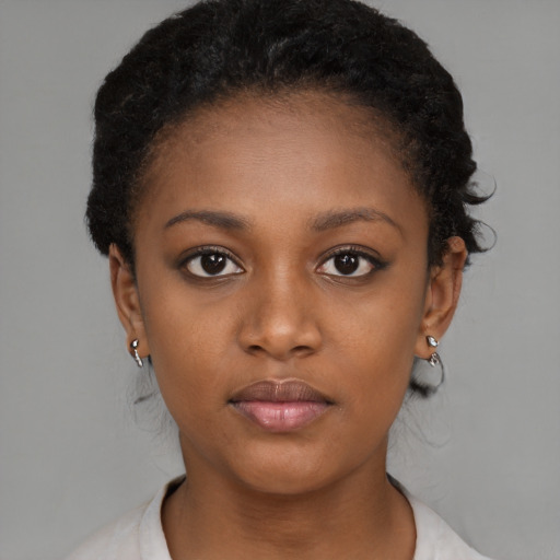 Neutral black young-adult female with short  brown hair and brown eyes