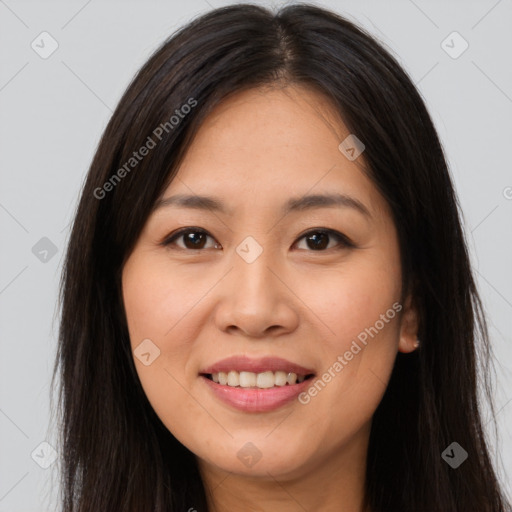 Joyful asian young-adult female with long  brown hair and brown eyes