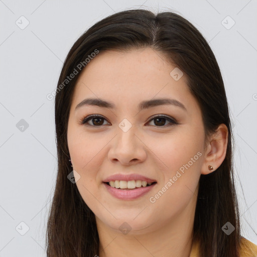 Joyful asian young-adult female with long  brown hair and brown eyes