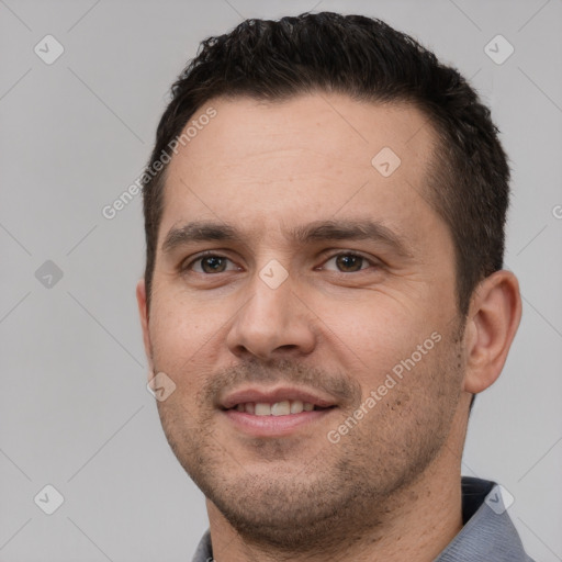 Joyful white young-adult male with short  brown hair and brown eyes