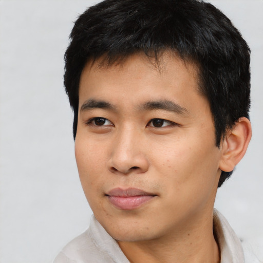 Neutral asian young-adult male with short  black hair and brown eyes