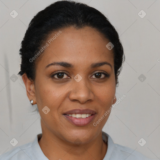 Joyful black young-adult female with short  brown hair and brown eyes