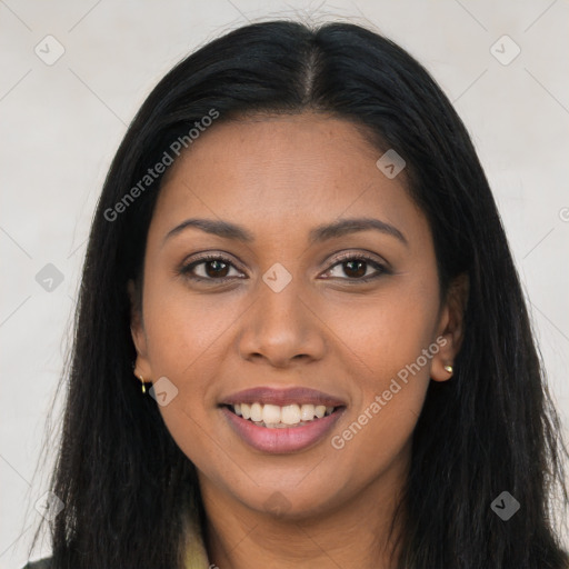 Joyful latino young-adult female with long  brown hair and brown eyes