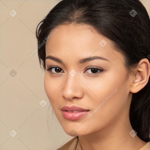 Joyful latino young-adult female with long  brown hair and brown eyes