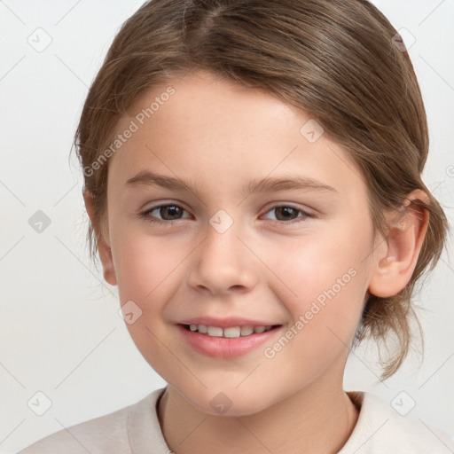 Joyful white child female with medium  brown hair and brown eyes