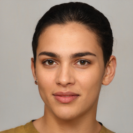 Joyful white young-adult female with short  brown hair and brown eyes