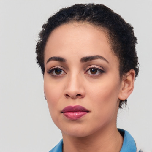 Neutral black young-adult female with short  black hair and brown eyes