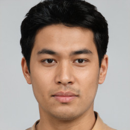 Neutral asian young-adult male with short  black hair and brown eyes