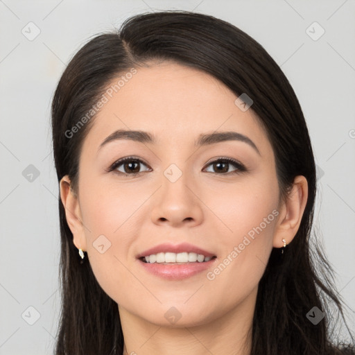 Joyful white young-adult female with long  black hair and brown eyes