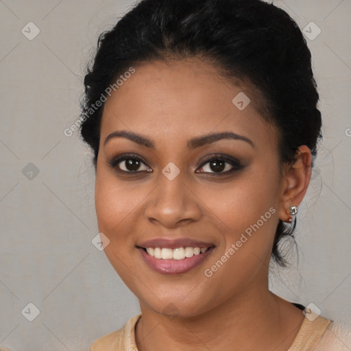 Joyful latino young-adult female with long  black hair and brown eyes