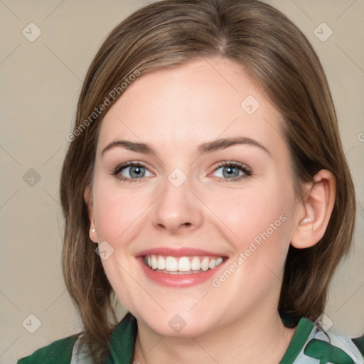 Joyful white young-adult female with medium  brown hair and green eyes