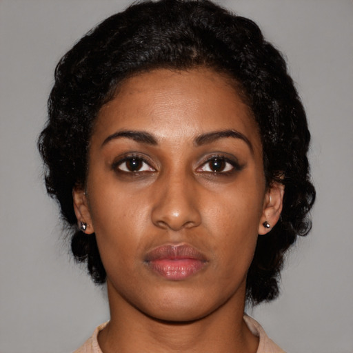 Neutral latino young-adult female with short  black hair and brown eyes