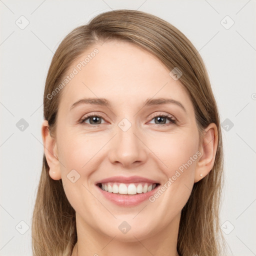 Joyful white young-adult female with long  brown hair and grey eyes