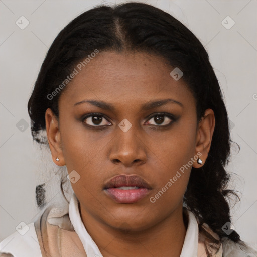 Neutral black young-adult female with medium  brown hair and brown eyes