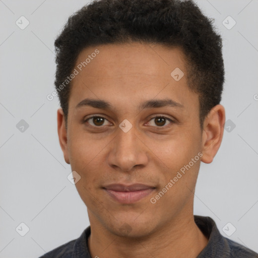 Joyful latino young-adult male with short  brown hair and brown eyes