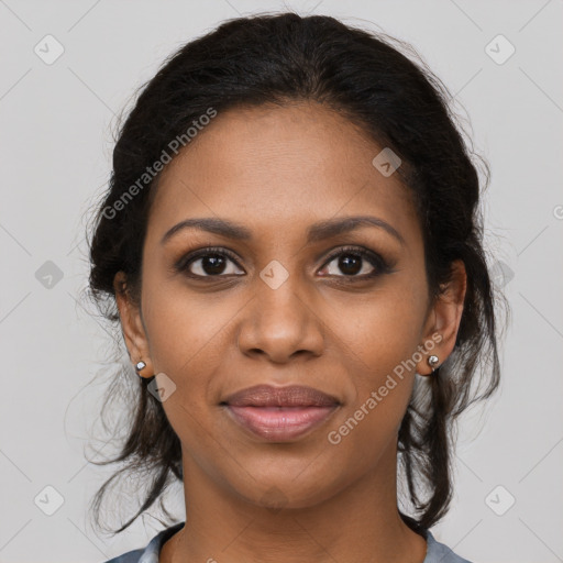 Joyful black young-adult female with long  brown hair and brown eyes