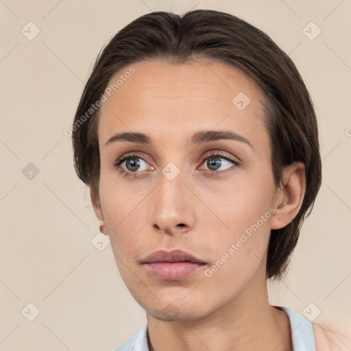 Neutral white young-adult female with medium  brown hair and brown eyes