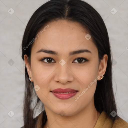 Joyful asian young-adult female with long  brown hair and brown eyes