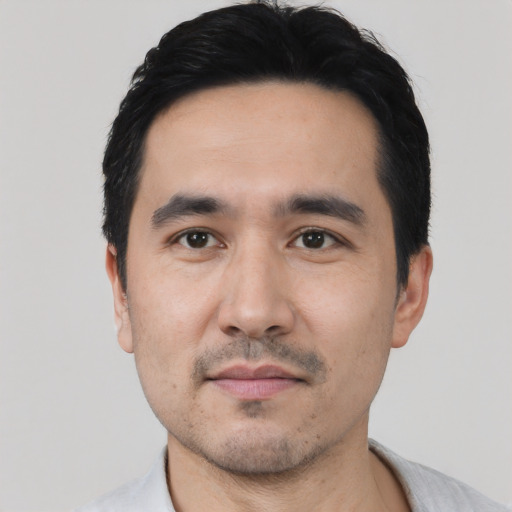 Neutral asian young-adult male with short  black hair and brown eyes