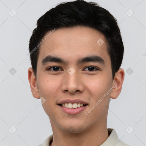 Joyful white young-adult male with short  black hair and brown eyes