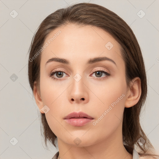 Neutral white young-adult female with medium  brown hair and brown eyes