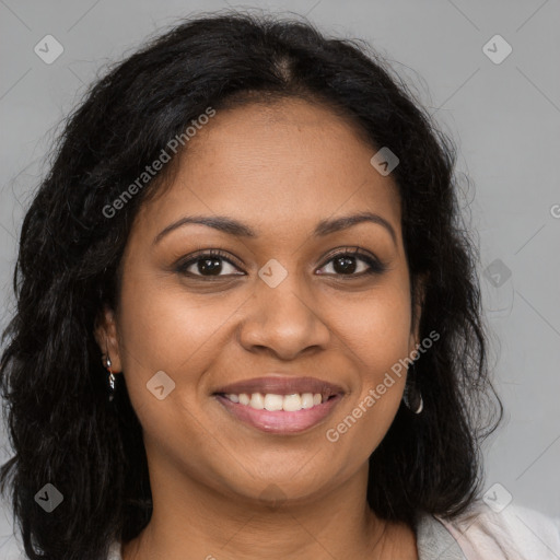 Joyful black young-adult female with long  brown hair and brown eyes