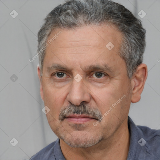 Neutral white middle-aged male with short  gray hair and brown eyes