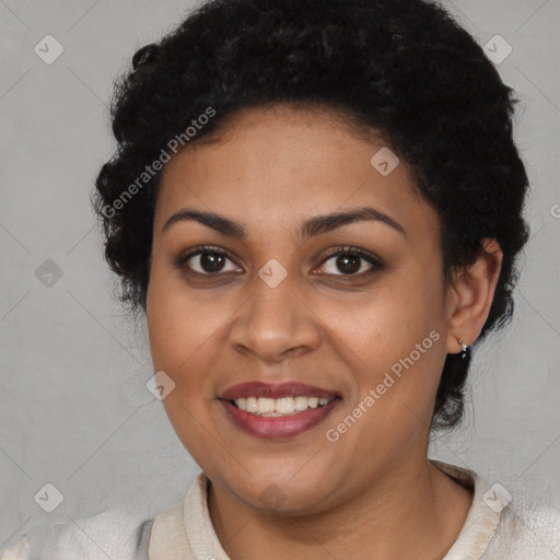 Joyful latino young-adult female with short  brown hair and brown eyes