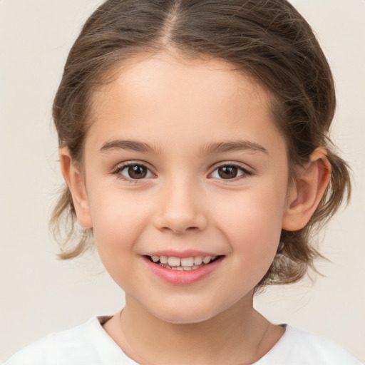 Joyful white child female with medium  brown hair and brown eyes