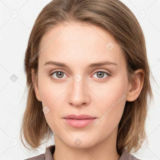 Joyful white young-adult female with medium  brown hair and blue eyes