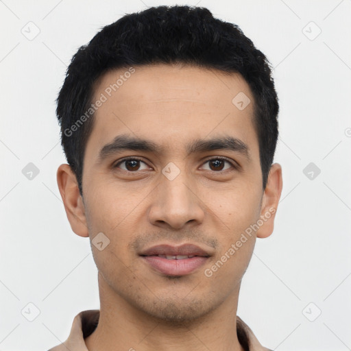 Joyful asian young-adult male with short  black hair and brown eyes