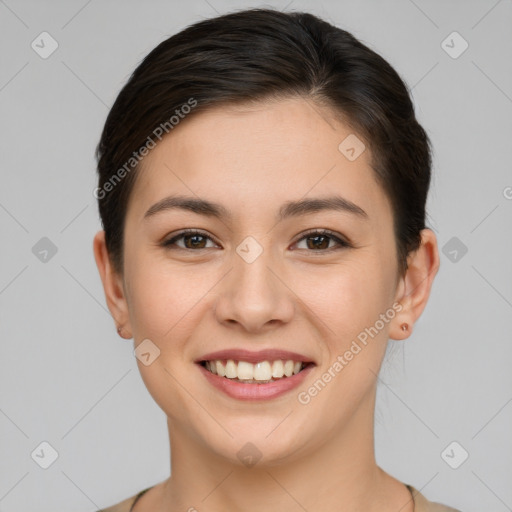 Joyful white young-adult female with short  brown hair and brown eyes