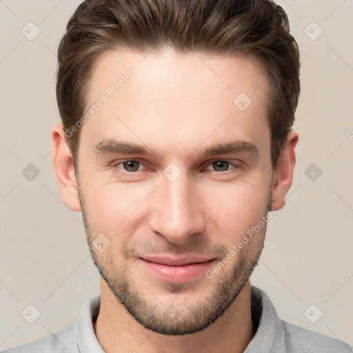 Joyful white young-adult male with short  brown hair and brown eyes