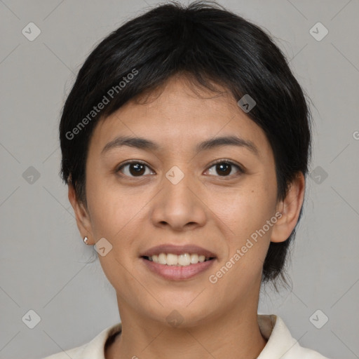 Joyful asian young-adult female with short  brown hair and brown eyes