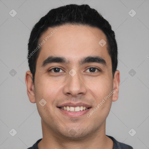 Joyful white young-adult male with short  black hair and brown eyes