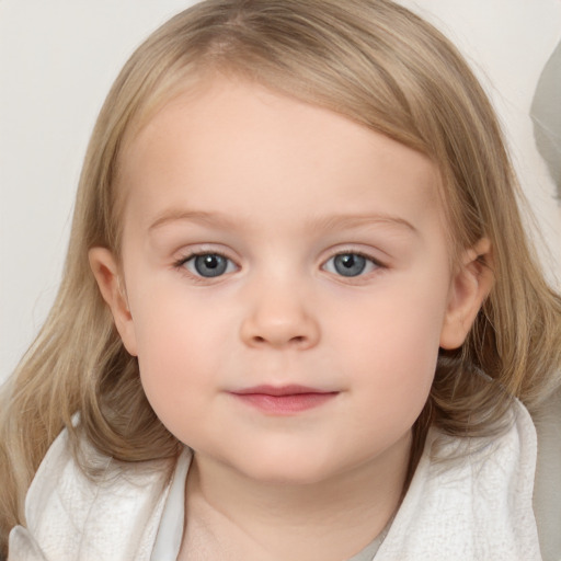 Joyful white child female with medium  brown hair and blue eyes