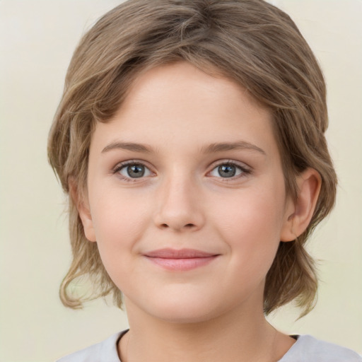 Joyful white child female with medium  brown hair and grey eyes