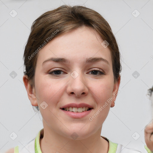 Joyful white young-adult female with short  brown hair and grey eyes