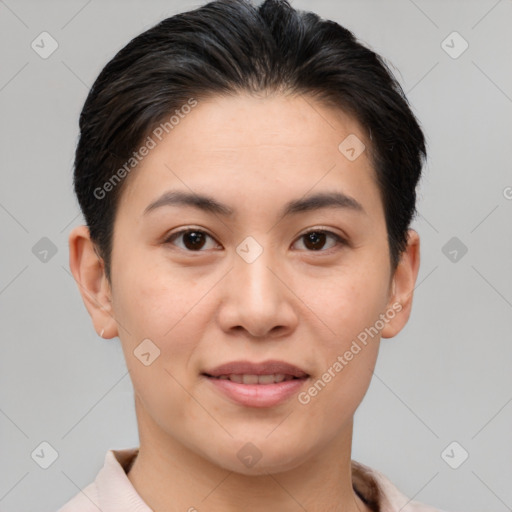 Joyful asian young-adult female with short  brown hair and brown eyes