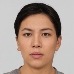 Neutral asian young-adult female with short  brown hair and brown eyes