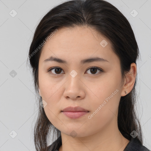 Neutral asian young-adult female with medium  brown hair and brown eyes