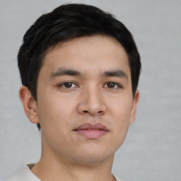 Neutral asian young-adult male with short  brown hair and brown eyes