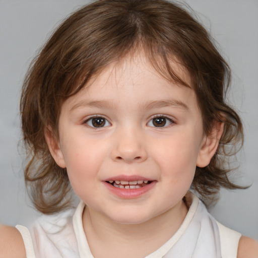 Joyful white child female with medium  brown hair and brown eyes