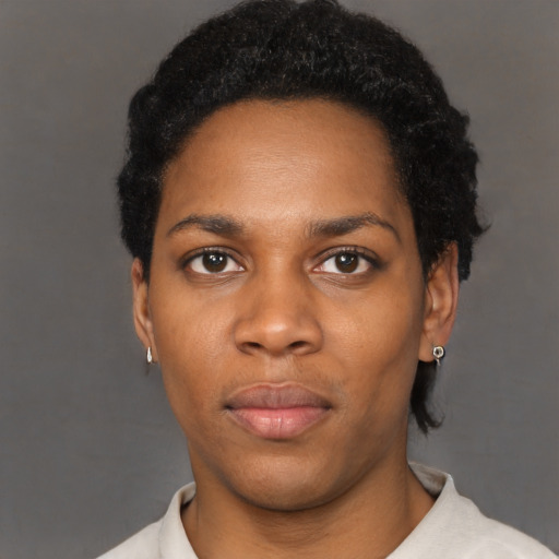 Neutral black young-adult female with short  black hair and brown eyes