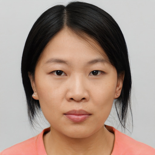 Neutral asian young-adult female with medium  black hair and brown eyes